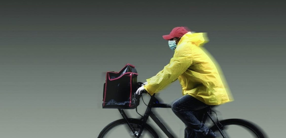 Masked Man on Bicycle